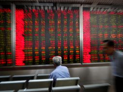 Las acciones relacionadas con la energía retrocedieron debido a un descenso en el precio del petróleo. AP/A. Wong