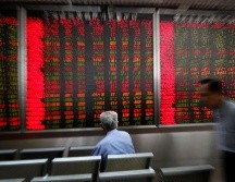 Las acciones relacionadas con la energía retrocedieron debido a un descenso en el precio del petróleo. AP/A. Wong