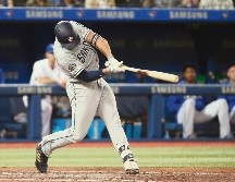 Hunter Renfroe conectó dos de los siete cuadrangulares de los Padres ayer en Toronto, uno de ellos de tres carreras en la paliza de San Diego sobre los Azulejos. AFP / T. Szczerbowski