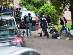 Miembros de la Fiscalía antiterrorista de París realizan investigaciones relacionadas con la explosión. AFP/R. Lafrabegue