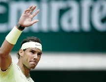 Rafael Nadal requirió de 118 minutos para despachar a su primer rival en la arcilla de París, donde busca su decimosegundo título del torneo. EFE / Y. Valat