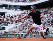 El alemán Zverev tuvo que invertir más de cuatro horas para ganar en cinco sets al australiano John Millman. AFP / P. Lopez