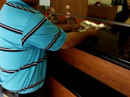 La moneda se compró en un precio mínimo de 18.05 pesos. EL INFORMADOR/ARCHIVO