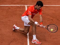 ''Nole'', que persigue en París encadenar su cuarto Grand Slam y convertirse en el primer tenista que lo hace por segunda vez, se medirá después al italiano Salvatore Caruso. AFP / K. Tribouillard