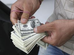 Se espera que el tipo de cambio cotice entre 19.10 y 19.30 pesos por dólar. AP / ARCHIVO