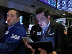 El promedio industrial Dow Jones descendió 354 puntos, o 1.4 por ciento, para ubicarse en 24 mil 815 unidades. AP/R. Drew