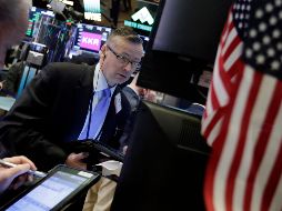 El índice industrial Dow Jones reporta un alza de 31.07 puntos (0.12 por ciento) para colocarse en 25 mil 570.64 unidades. AP / ARCHIVO