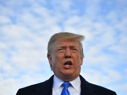 Luego de varios días de negociaciones, Trump anuncia que se ha llegado a un acuerdo favorable. AFP/M. Ngan