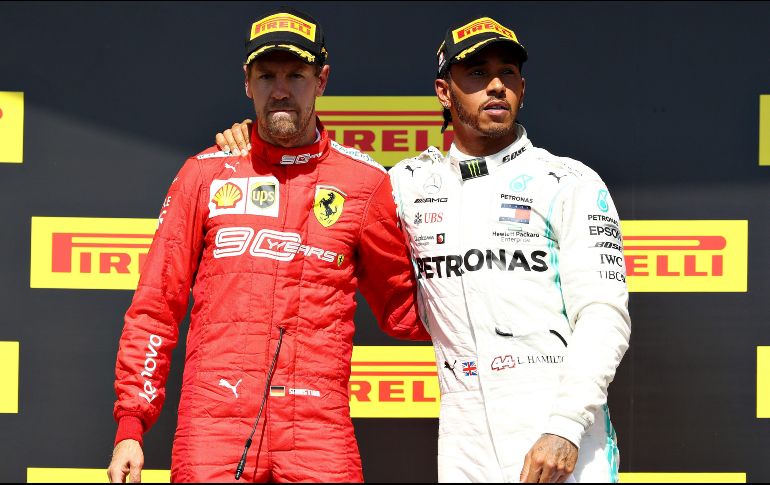 Los comisarios de la carrera dieron al alemán una penalización de cinco segundos por un reingreso peligroso de Vettel. AFP / M. Thompson