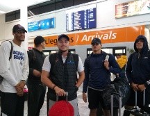 Jugadores de Gigantes a su llegada a Tijuana para iniciar los playoffs. TWITTER / @CIBACOPAdp