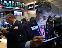 El promedio industrial Dow Jones retrocedió 14 puntos, 0.1%, a 26 mil 048 unidades. AP/R. Drew