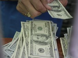 El tipo de cambio para solventar operaciones denominadas en moneda extranjera pagaderas en el país es de 19.1222 pesos. EL INFORMADOR / ARCHIVO