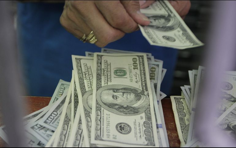 El tipo de cambio para solventar operaciones denominadas en moneda extranjera pagaderas en el país es de 19.1222 pesos. EL INFORMADOR / ARCHIVO