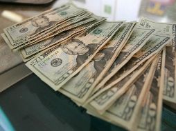 El tipo de cambio para solventar operaciones denominadas en moneda extranjera pagaderas en el país es de 19.1383 pesos. EL INFORMADOR / ARCHIVO