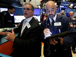 El índice industrial Dow Jones retrocedió 17 puntos, o 0.1 por ciento, a 26 mil 089 unidades. AP/R. Drew
