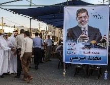 Morsi fue enterrado el martes en medio de fuertes medidas de seguridad. AFP/S. Khatib