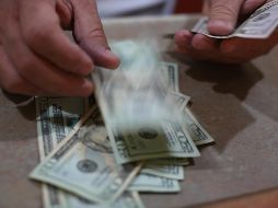 El billete verde se compró en un mínimo de 18 pesos. EL INFORMADOR/ARCHIVO