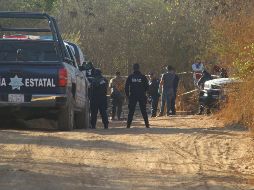 Los cadáveres de dos hombres y una mujer son rescatados de entre la tierra, luego de que una llamada al Sistema de Emergencias 911 alertó a la autoridad de la existencia de cadáveres cerca de unos campos deportivos. NTX / ARCHIVO