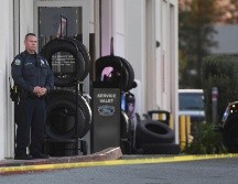 Policías resguardan la zona donde ocurrió la agresión a tiros. AP/N. Coury