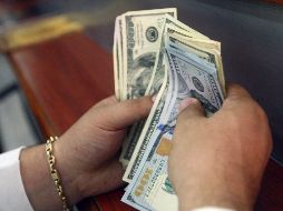 Este jueves, el billete verde se compró en un mínimo de 18 pesos. EL INFORMADOR/ARCHIVO