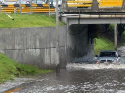 Cada año, las inmediaciones de la glorieta Arcos del Milenio resultan afectadas por severas inundaciones. EL INFORMADOR/ARCHIVO