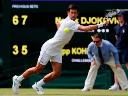 El serbio inició de gran manera la defensa de su título en el torneo británico.  AFP / A. Dennis