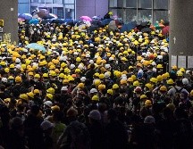 Habitantes se manifiestan en el aniversario del traspaso a China de la soberanía sobre Hong Kong por parte del Reino Unido. AFP/D. De la Rey