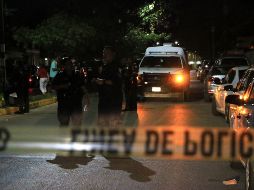 Policías custodian este miércoles la escena de la investigación tras el reporte de la desaparición. EFE/L. Cruz