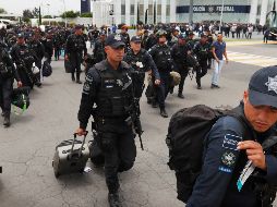 Policías federales que esperaban en Santa Lucía para ser trasladados a Baja California llegaron a las instalaciones del Centro de Mando de Iztapalapa para reforzar la protesta en rechazo a su incorporación a la Guardia Nacional. AP/M. Ugarte