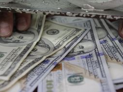 El tipo de cambio para solventar operaciones denominadas en moneda extranjera se ubica en 19.0502 pesos. EL INFORMADOR / ARCHIVO