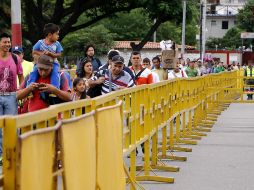 250 mil venezolanos han recibido el PTT. EFE