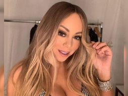 Mariah Carey sólo utiliza su voz en un grito para abrir la botella. INSTAGRAM / @mariahcarey