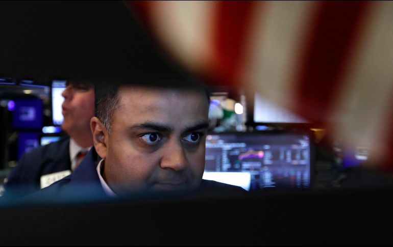 El promedio industrial Dow Jones sumó 76 unidades, 0.3%, y cerró en 26 mil 860 puntos. AP/R. Drew