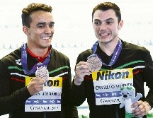 Juan Celaya (izq.) y Yahel Castillo (der.) terminaron en el tercer sitio desde el trampolín de tres metros; México logró otro bronce en plataforma mixta. AFP / M. Vatsyayana