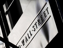 El Dow Jones aumentó 27 unidades, llegó a 27 mil 359 puntos. AP / ARCHIVO