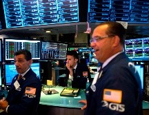 El promedio industrial Dow Jones perdió 23 unidades, o 0.1%, para situarse en 27 mil 335 puntos. AFP/J. Eisele