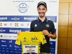 Julian Alaphilippe es el actual poseedor del suéter amarillo de la vuelta francesa, que reanuda hoy su actividad. AFP / P. Pavani
