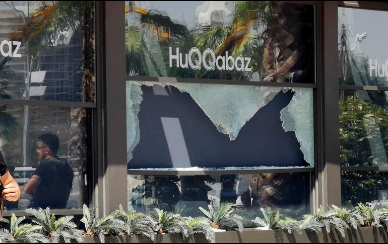 Aspectos del restaurante donde ocurrió el tiroteo de este miércoles. AP/RUDAW Facebook TV