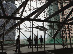 A pesar de las proyecciones del CCIJ, las estadísticas oficiales señalan que la baja económica sólo se da en sectores concretos como la construcción. EFE/Archivo