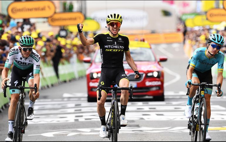 A 42 kilómetros de la meta, Yates (C) comenzó a fraguar su victoria. Salió del grupo de punta y pegó una carrera sensacional. AFP / A. C. Poujoulat