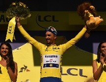 Con su victoria, el galo mantiene el maillot amarillo. AFP / J. Pachoud