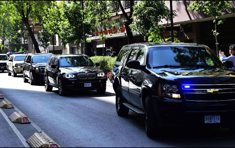 Pompeo y personal del Servicio Secreto salieron de las oficinas alrededor de las 11:35 horas. AFP / P. Pardo