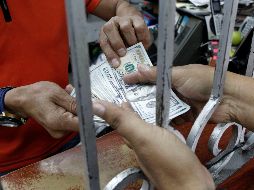 La moneda se compró en un precio mínimo de 17.90 pesos. EL INFORMADOR/ARCHIVO