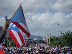 Este lunes se realizó la décima protesta en contra de Rosselló y fue una de las más concurridas en la que participaron miles de puertorriqueños. AFP / E. Rojas