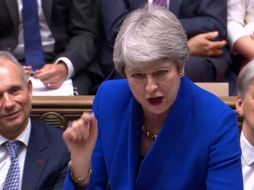 May aclara que seguirá siendo integrante del Parlamento. AFP