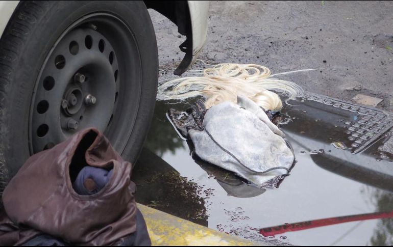 Al igual que la detenida por el presunto doble homicidio, la mujer que buscan las autoridades también usaba una peluca rubia para disfrazarse. SUN/ARCHIVO