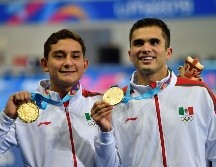 Los clavadistas dieron esta noche la medalla de oro 17 a México. AFP / P. Pardo