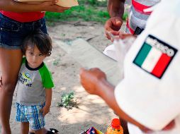 La Comisión Nacional de los Derechos Humanos y organismos internacionales de derechos le han dicho a autoriades mexicanas que ningún niño, en ninguna circunstancia, tiene que estar asegurado en una estación migratoria. AFP / ARCHIVO