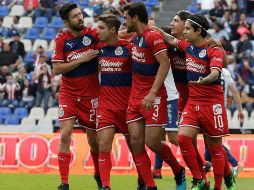 Los rojiblancos crearon pocos problemas en el área de los poblanos y al final terminaron rescatando el empate. EFE/H. Ríos