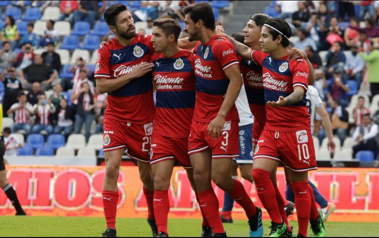 Los rojiblancos crearon pocos problemas en el área de los poblanos y al final terminaron rescatando el empate. EFE/H. Ríos